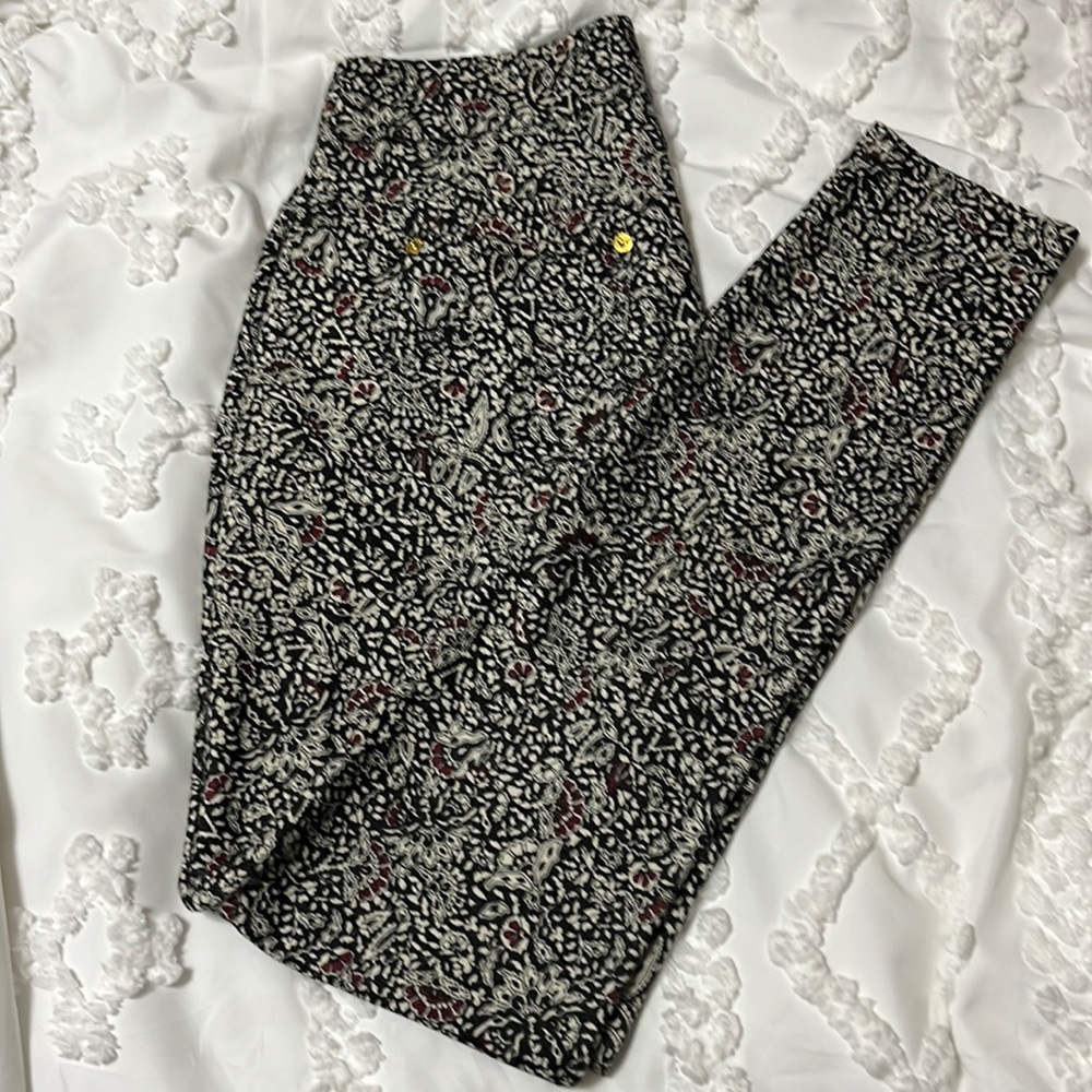 Michael Kors Leggings size P/S black, cream and a little red.